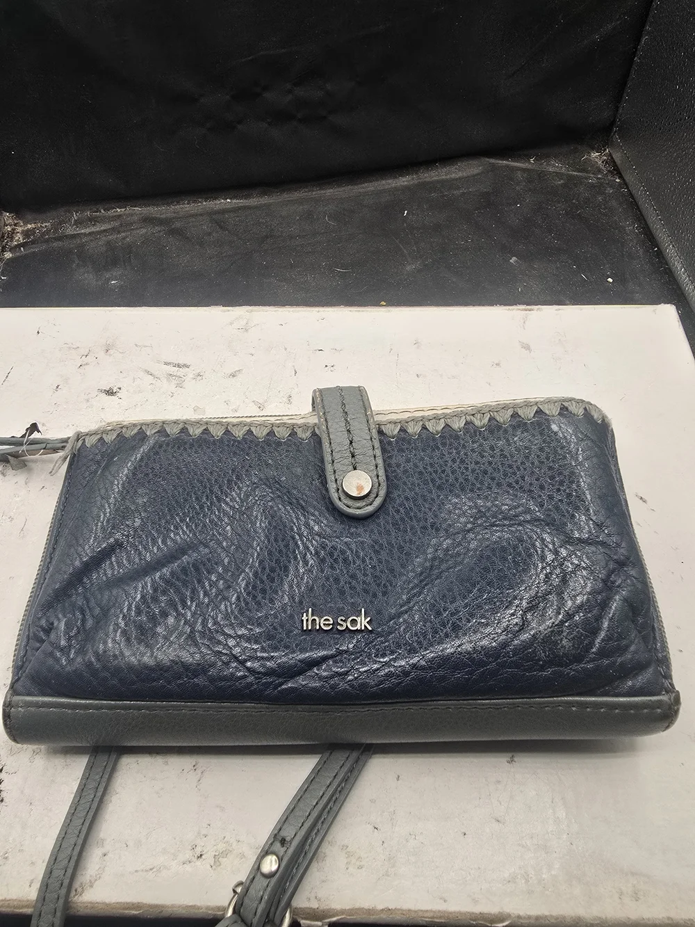 The Sak Navy and Gray Leather Wristlet Wallet‎ with Strap